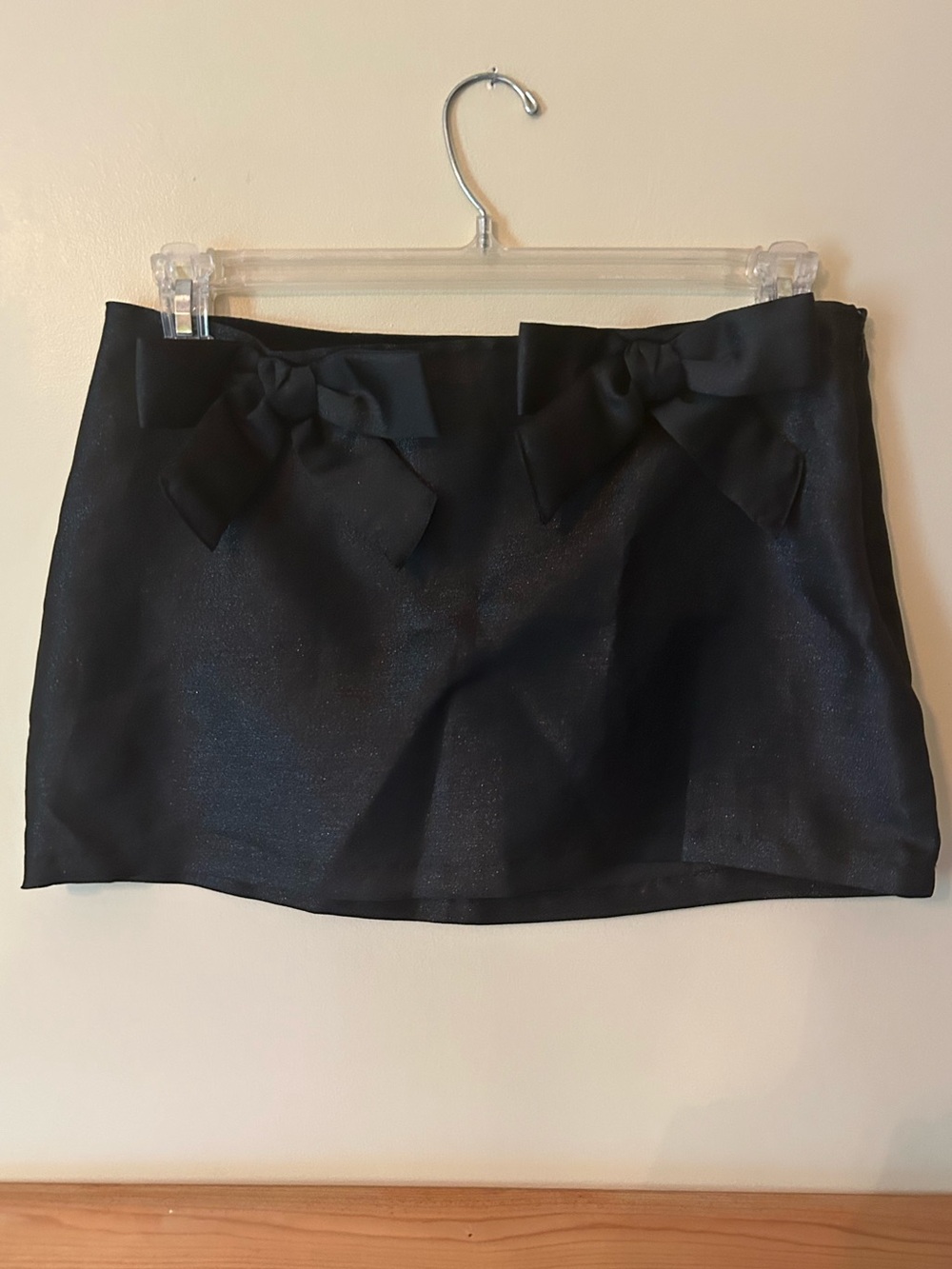 Urban Outfitters Black Shimmery Mini Skirt with Bow Accents